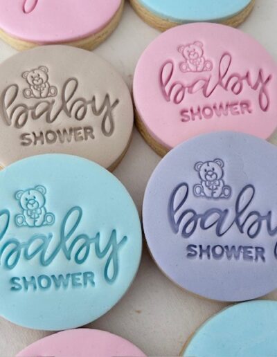 Quick and easy baby shower cookies in neutral, pink, purple or blue