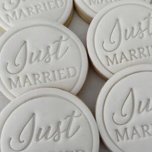 Just married cookies in white icing baked in brisbane
